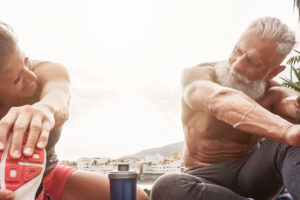 woman and man stretching
